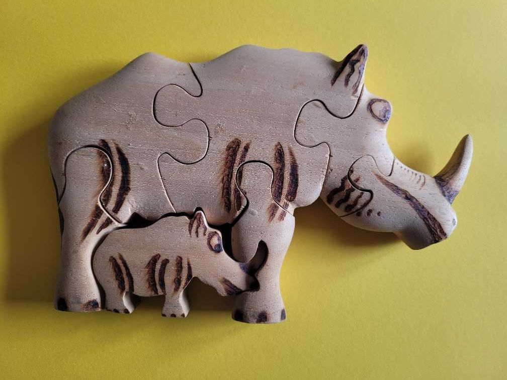 Binquedo em madeira, Rinoceronte com cria, puzzle - novo