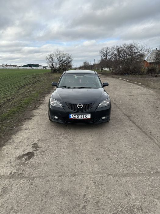 Мазда 3.