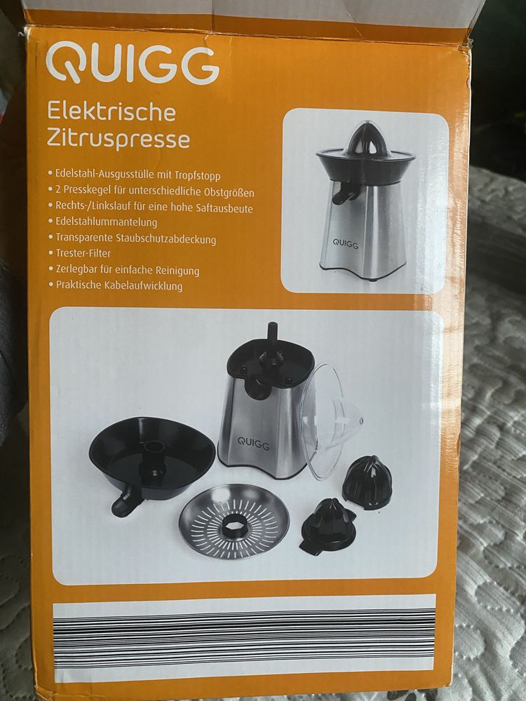 Elektryczna wyciskarka do cytrusow  Quigg