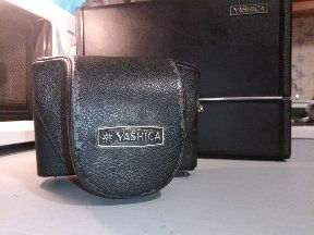 Yashica - caixa de arrumação rigida