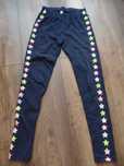 Granatowe legginsy w gwiazdki R. 146