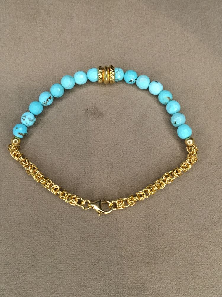 Pulseira em prata dourada e turquesas