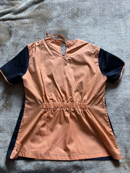 Жіночий медичний костюм