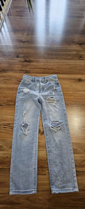 Spodnie z dziurami jeansy 140/146