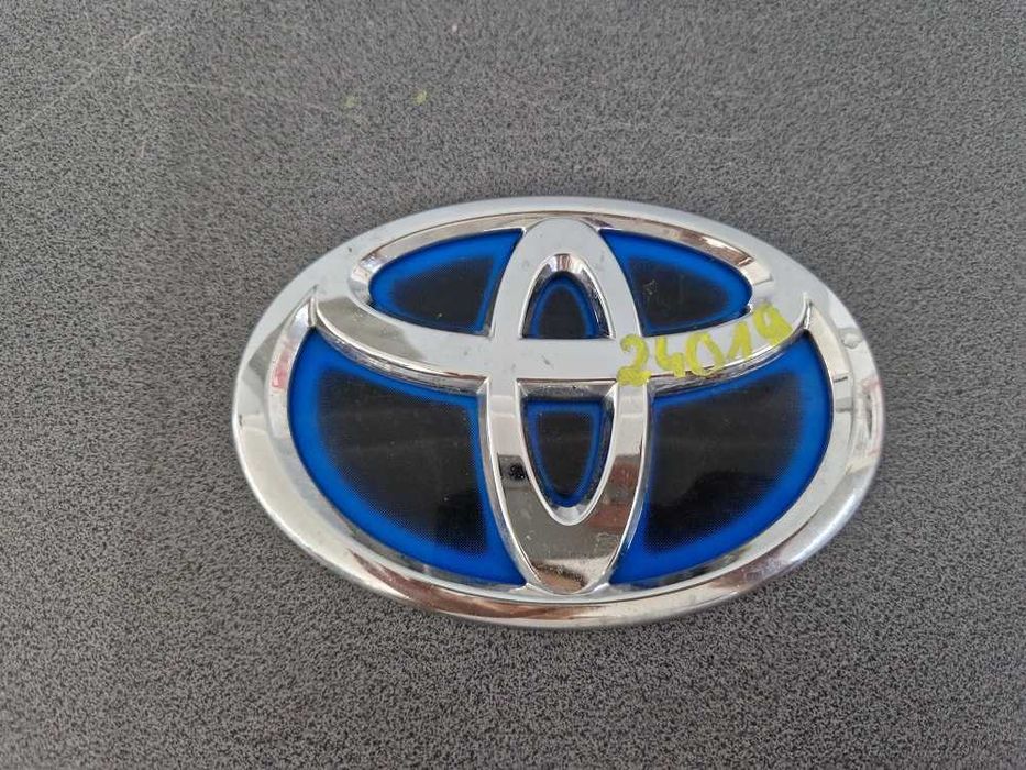 Toyota Corolla E21 Yaris IV Auris II Hybrid Emblemat Logo Znaczek