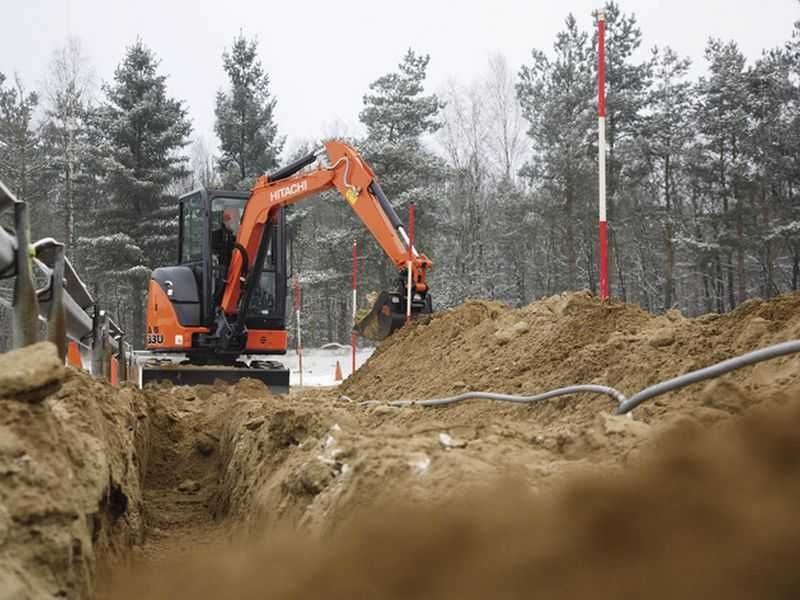 Koparka wyjajem usługi wykopy przyłącza zagęszczarki walec wypożycz