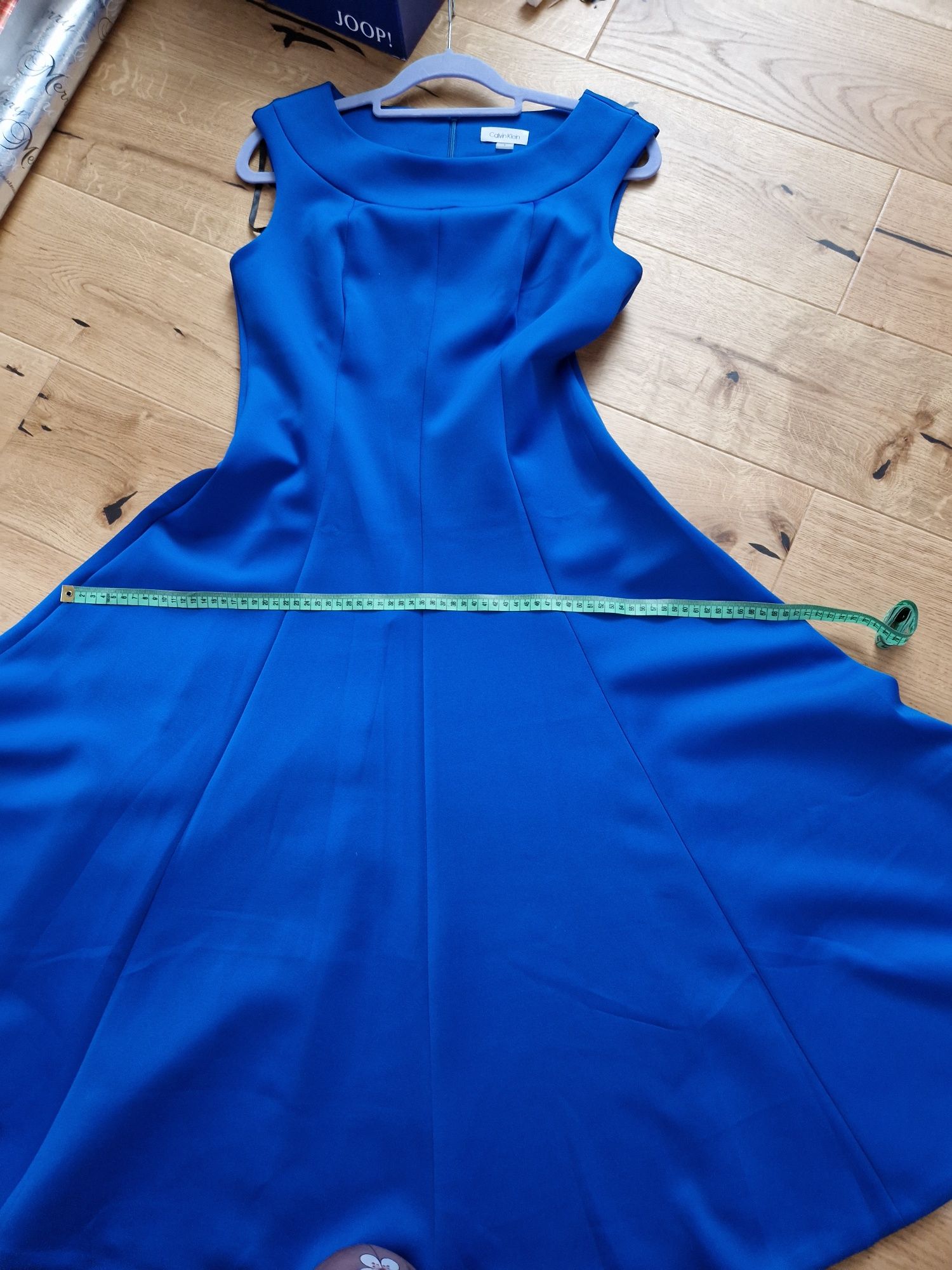 Nowa Sukienka, dluga Calvin Klein rozmiar 40 niebiesk