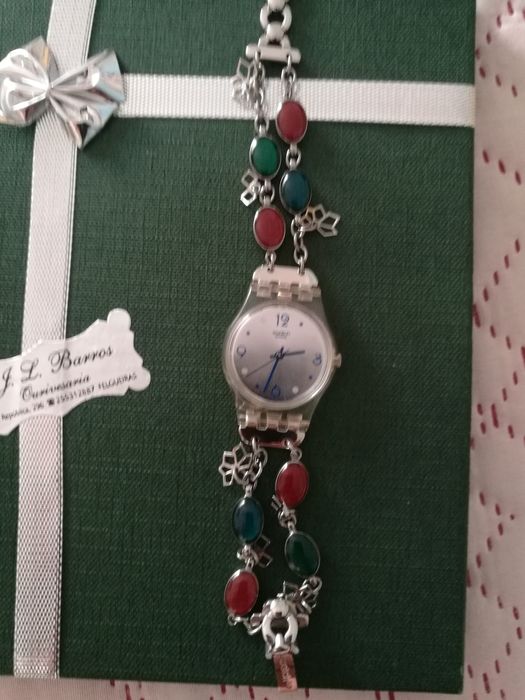 2 relógios de senhora swatch e festina
