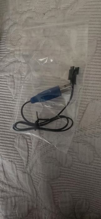 Maquina escavadora telecomando.