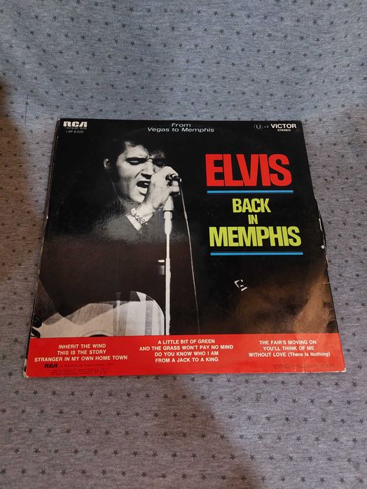 Discos de vinil elvis entre outros