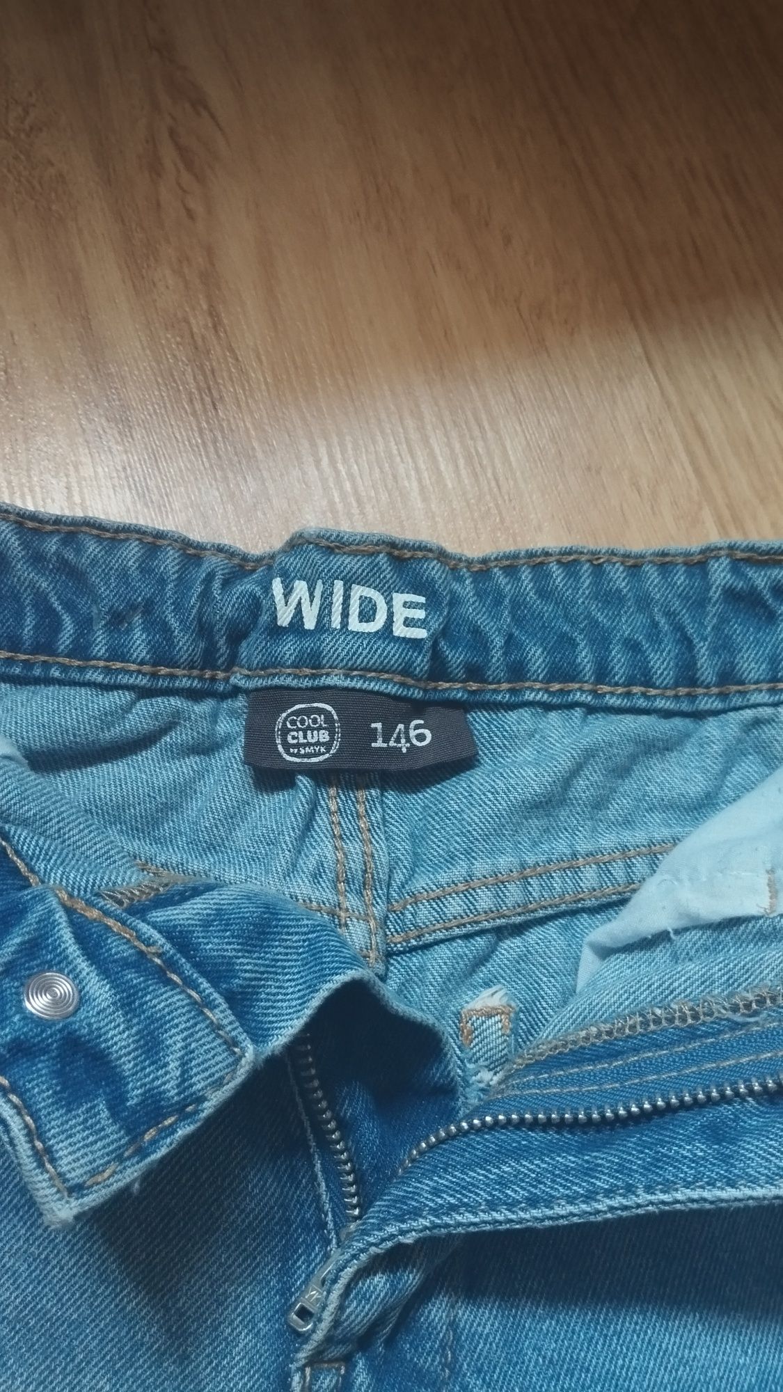 Spodnie jeans 146