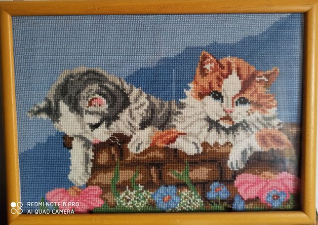 Dwa koty haft krzyżykowy