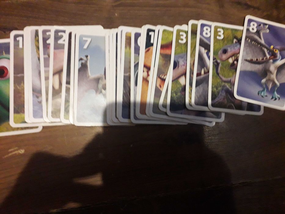 gra zręcznościowa karty dinozaury