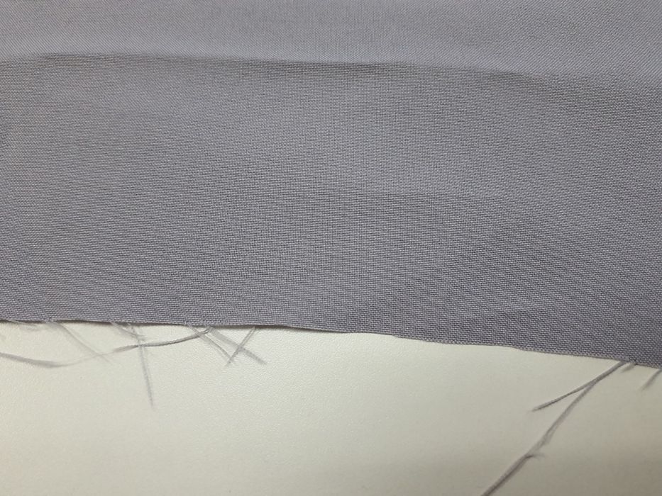 Tkanina jasny popiel szer.152 cm.