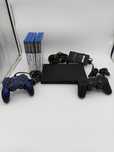 Konsola PlayStation 2 slim + gry + 2 pady
