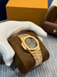 Patek Philippe Nautilus золото / swiss