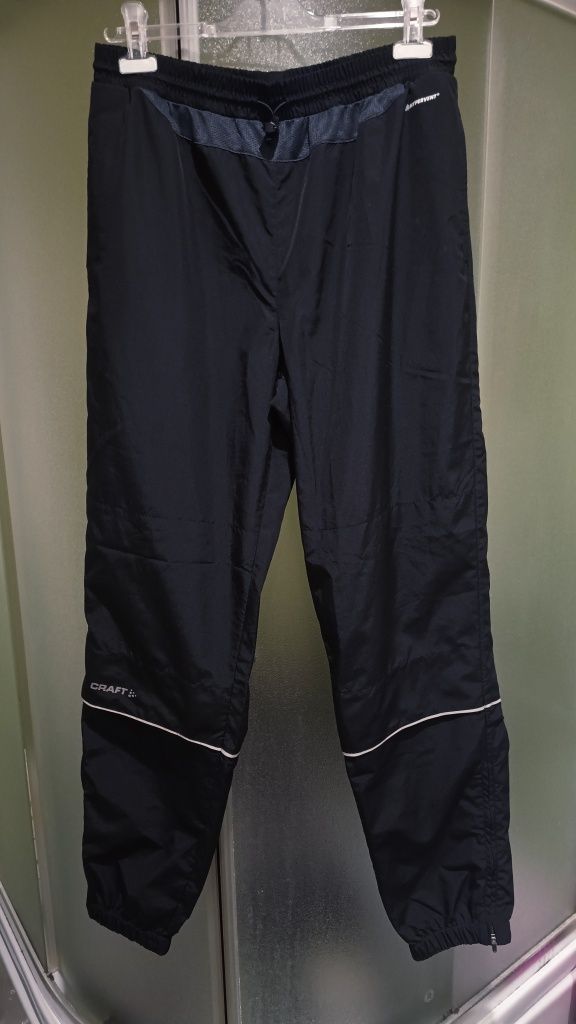 NOWE Craft Szwedzkie męskie spodnie sportowe windstoppery, Rozmiar L