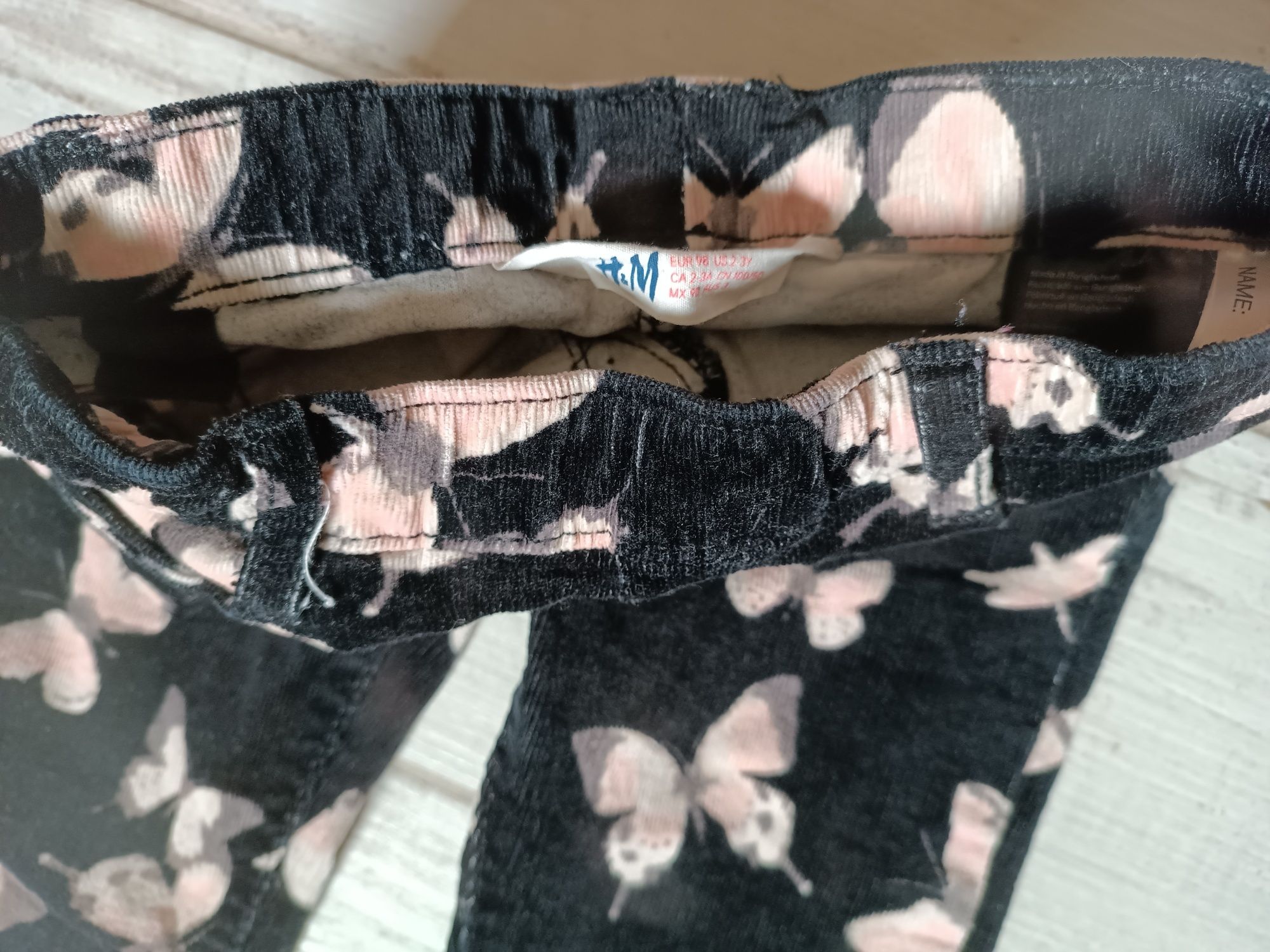 Spodnie jegginsy sztruksy kwiaty H&M 98 jak nowe