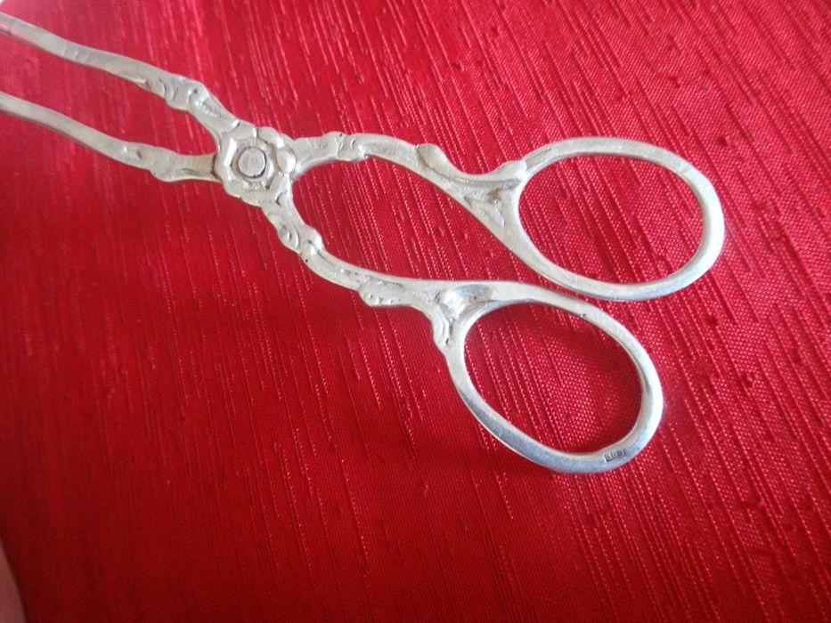 Srebrne szczypce do ciastek