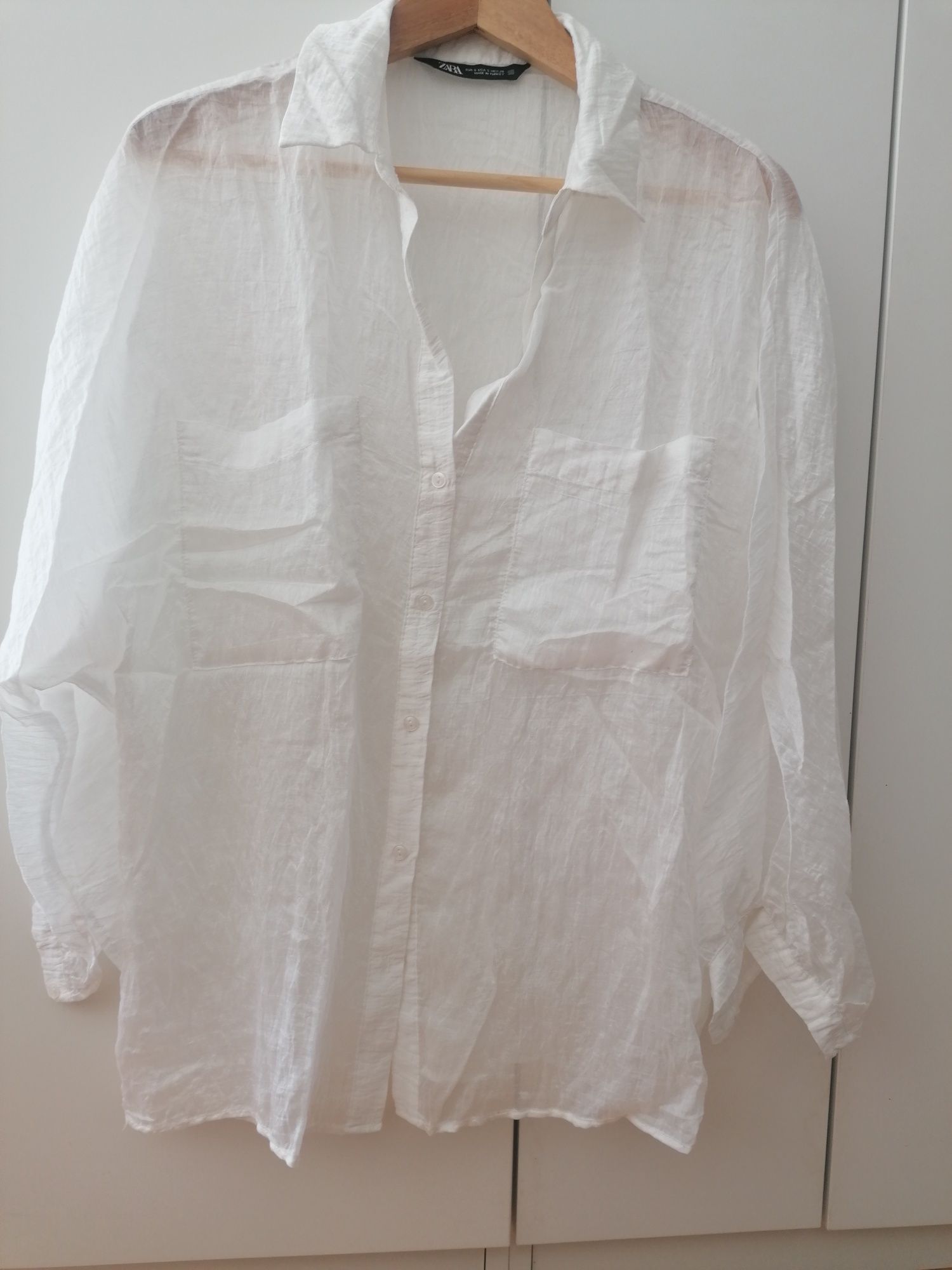 blusa branca transparente efeito enrugado