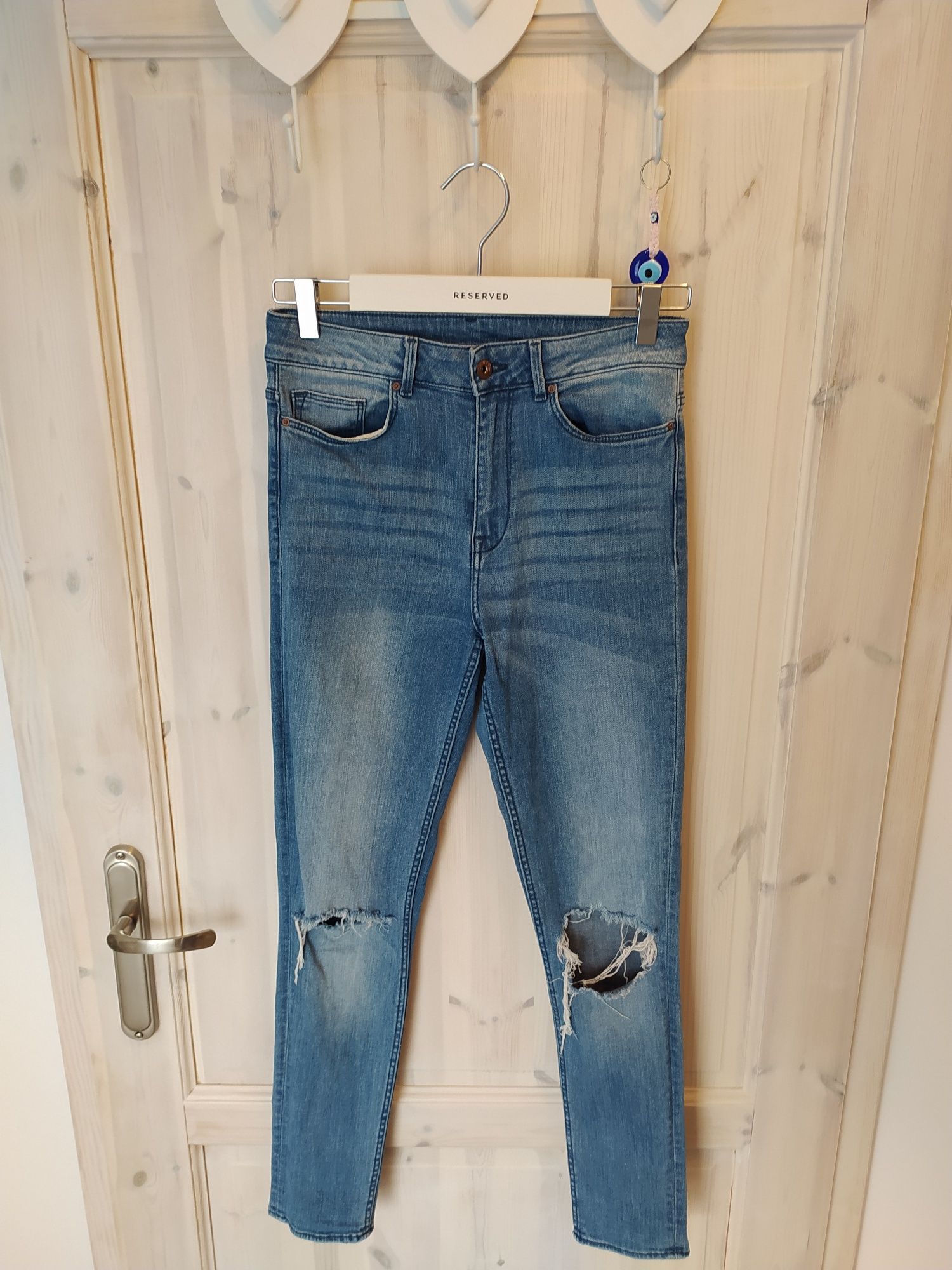 Jeansowe dżinsowe spodnie jeansy dżinsy z dziurami H&M 36 S