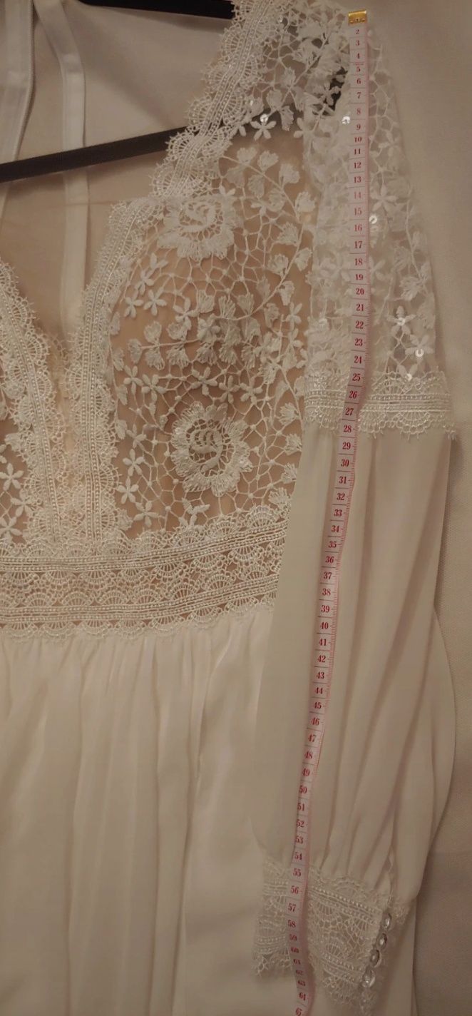 Koronkowa suknia ślubna boho