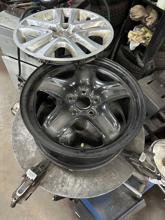 Felgi z kolpakami Opel Astra K