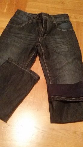 Sprzedam spodnie granatowe jeans ocieplane rozmiar 134 cm