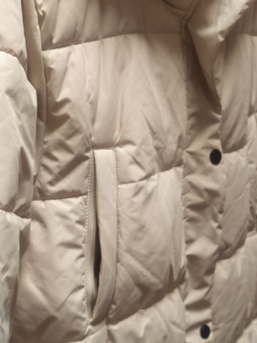 Жіночий пуховик peak