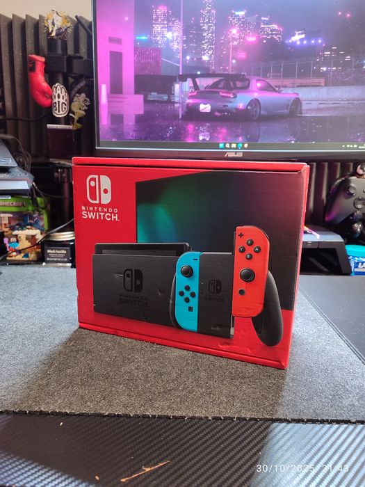 Nintendo Switch V2 – Vermelha/Azul + Skins + Vários Acessórios