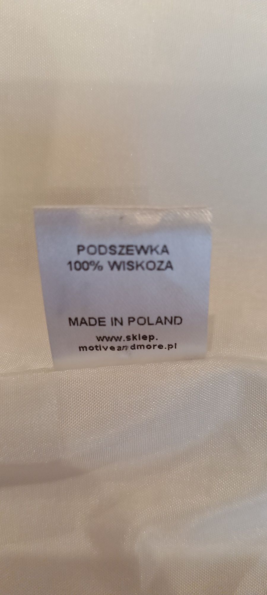 Kremowy płaszcz Motive&More złote guziki