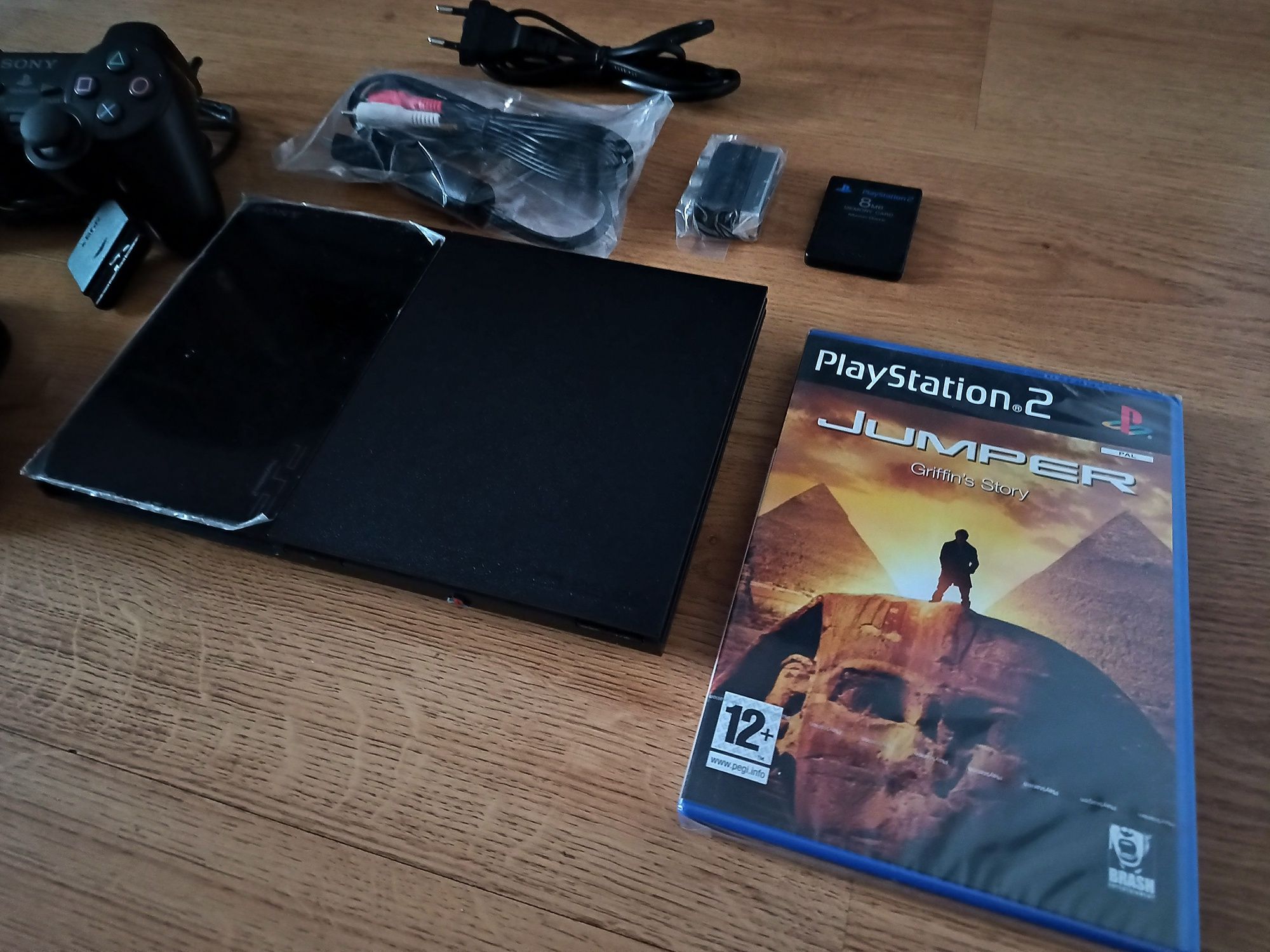 PlayStation 2 stan kolekcjonerski 2x pad + gra w folii!