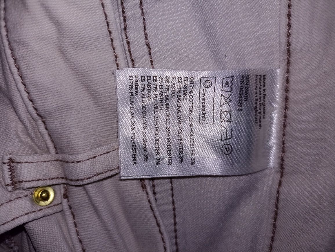 H&M eleganckie kremowe spodnie rurki  R. 42/44