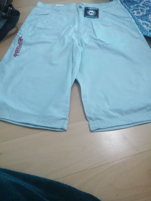 Calção rip curl, tamanho Médio, novo com etiqueta, bolsos de lado