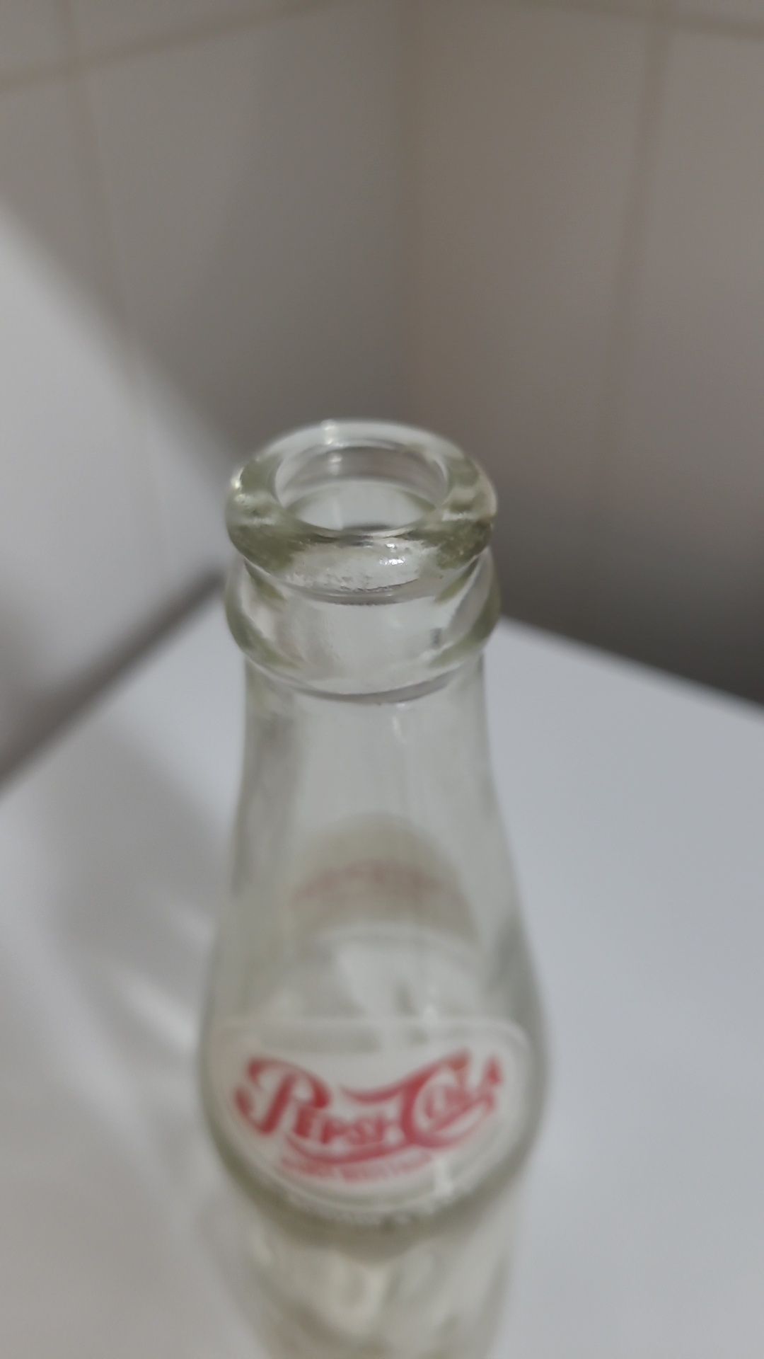 Antiga garrafa pirogravada de Coca-Cola