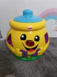 Fisher-Price „Ucz się i śmiej!“ Garnuszek na klocuszek