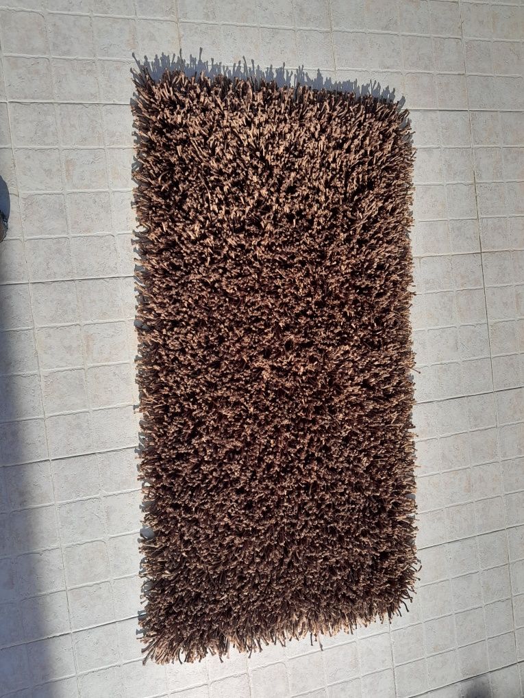 Carpetes e tapetes de fios altos