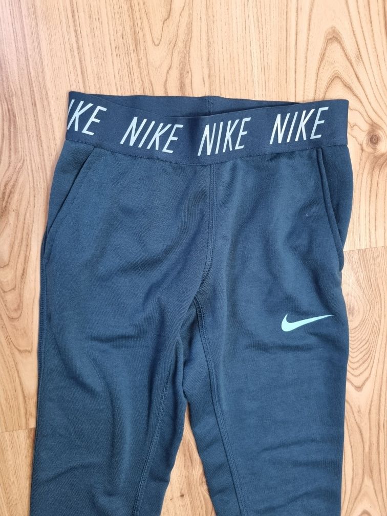 Spodnie dresy Nike 128-137cm 8-10lat jak nowe turkus