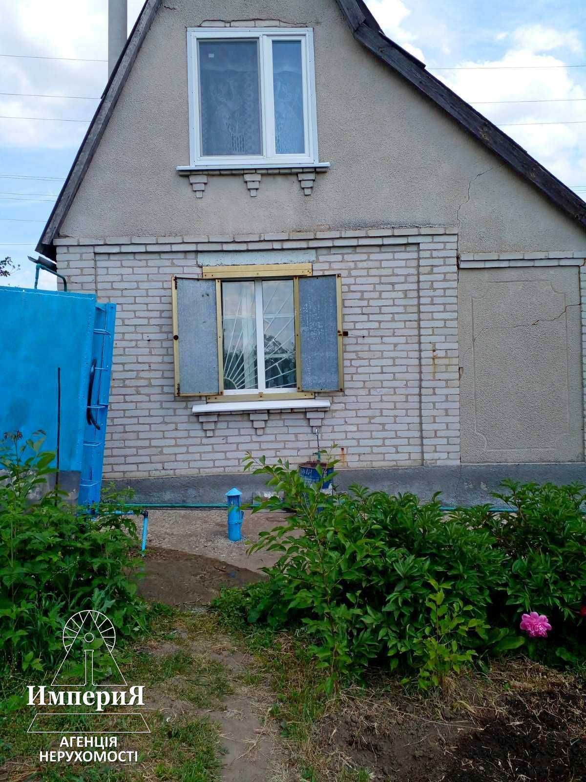 Кирпичный двухэтажный дом в СТ Озерное.