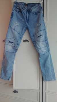 Spodnie jeansowe Cropp 34/34