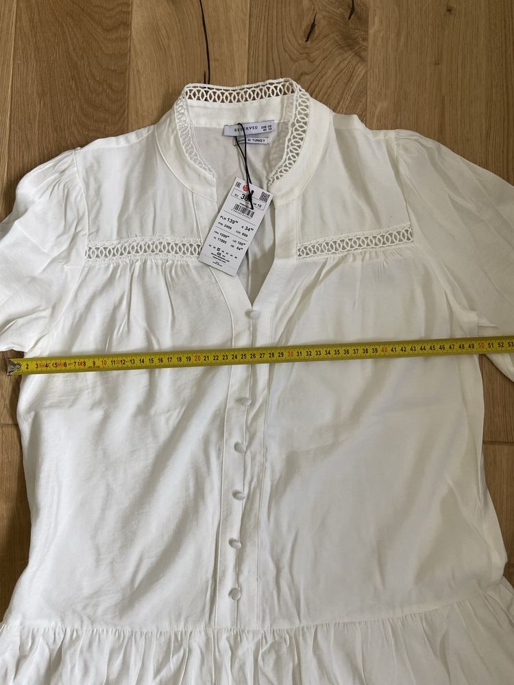Elegancka biala smietankowa koszula o przedluzonym fasonie Reserved 38