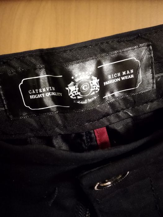 Eleganckie spodnie męskie 36/34