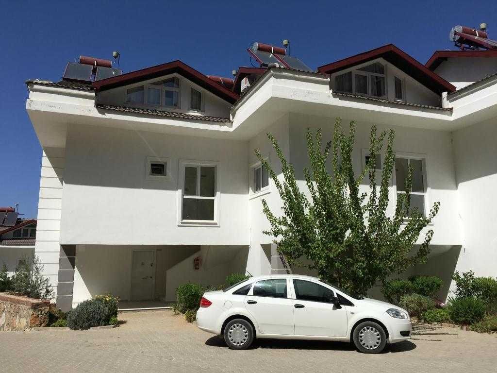 Аренда апартаментов 2+1, 90 м.кв. Личный сад с барбекю.Олюдениз,Турция