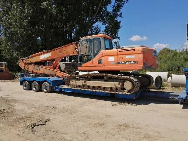 Transport niskopodwoziowy maszyn koparek dźwig HDS laweta platforma