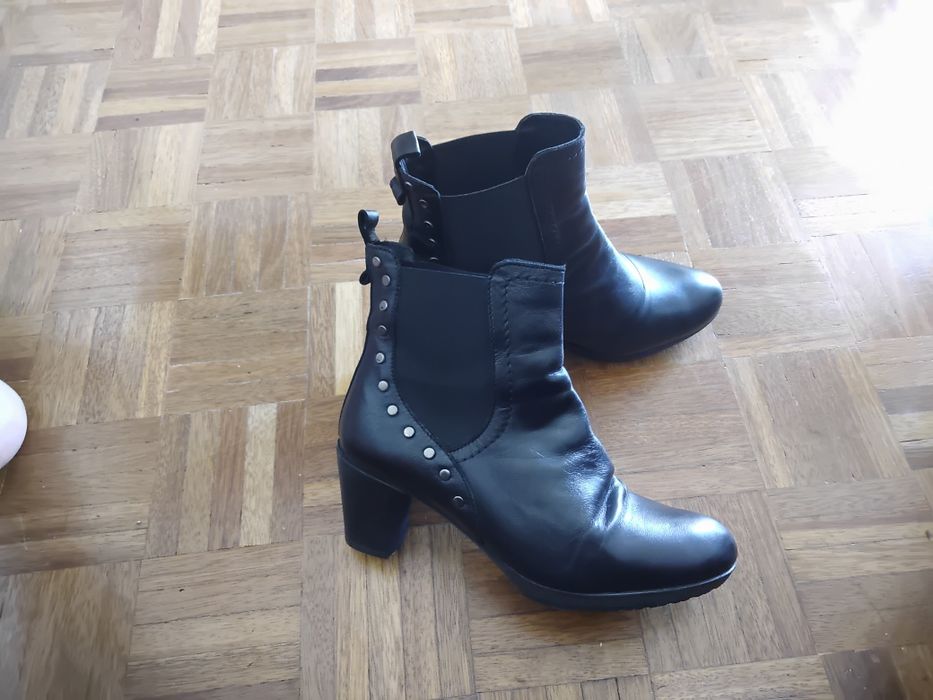 Botas de mulher, com salto alto