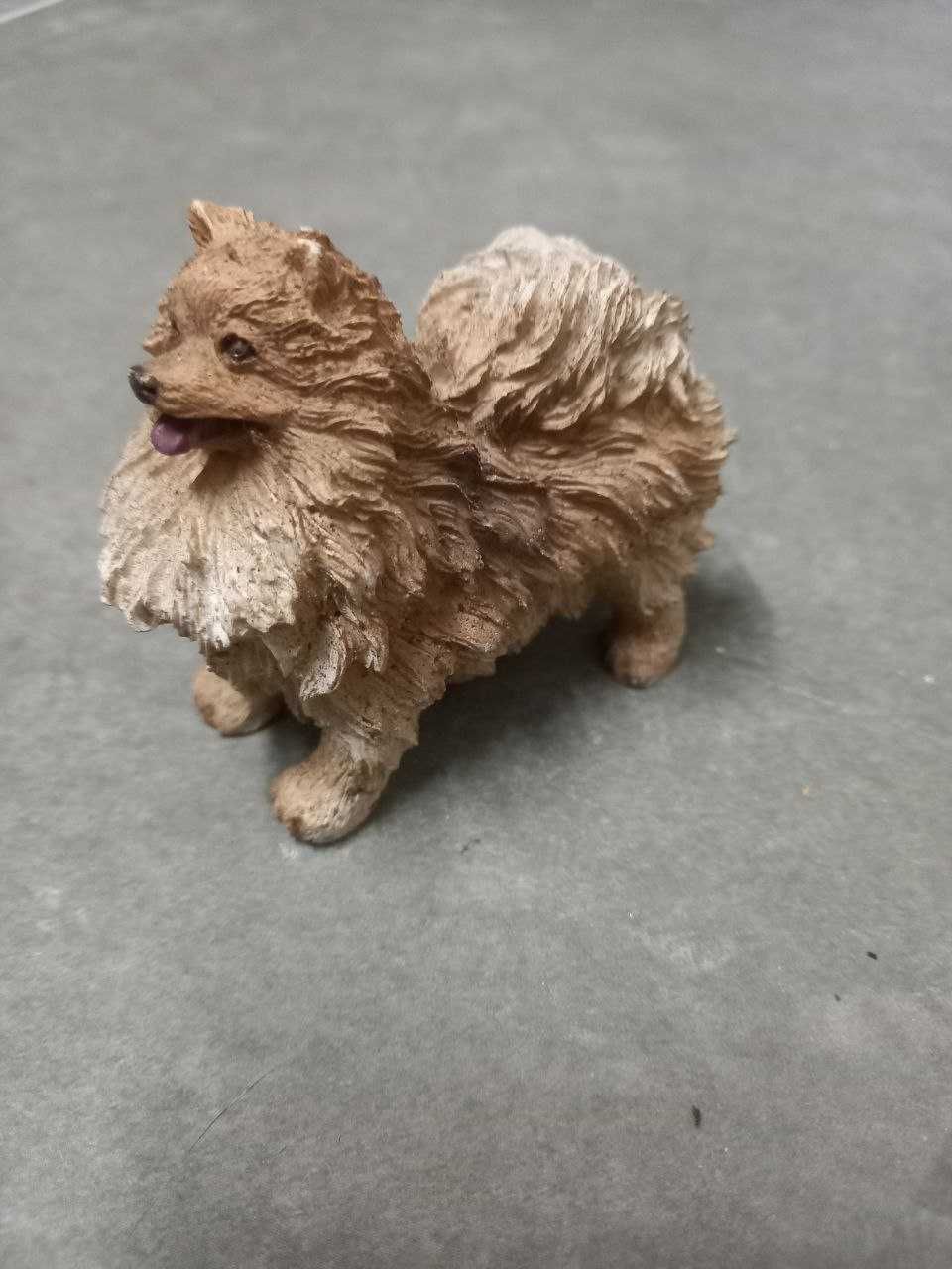 Brinquedo (ou peça decorativa) em forma de cão miniatura