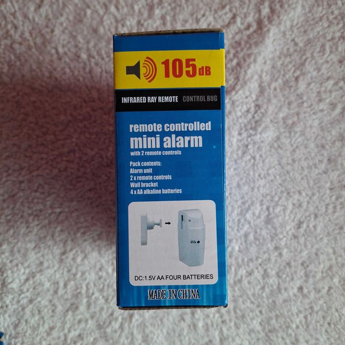 Mini Alarm Przenośny 105db 105 Stopni 8m 2 Piloty Uchwyt