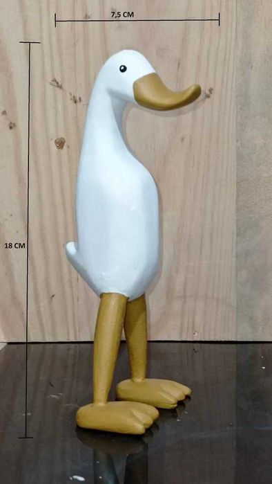 Conjunto de patos de madeira.