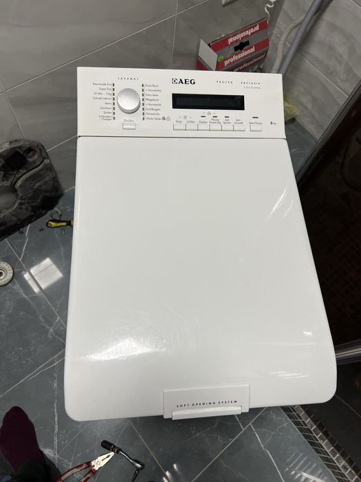 Пральна машинка aeg вертикальна