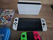 Nintendo Switch OLED + 2 pady + 2 gry + karta 256 GB + etui